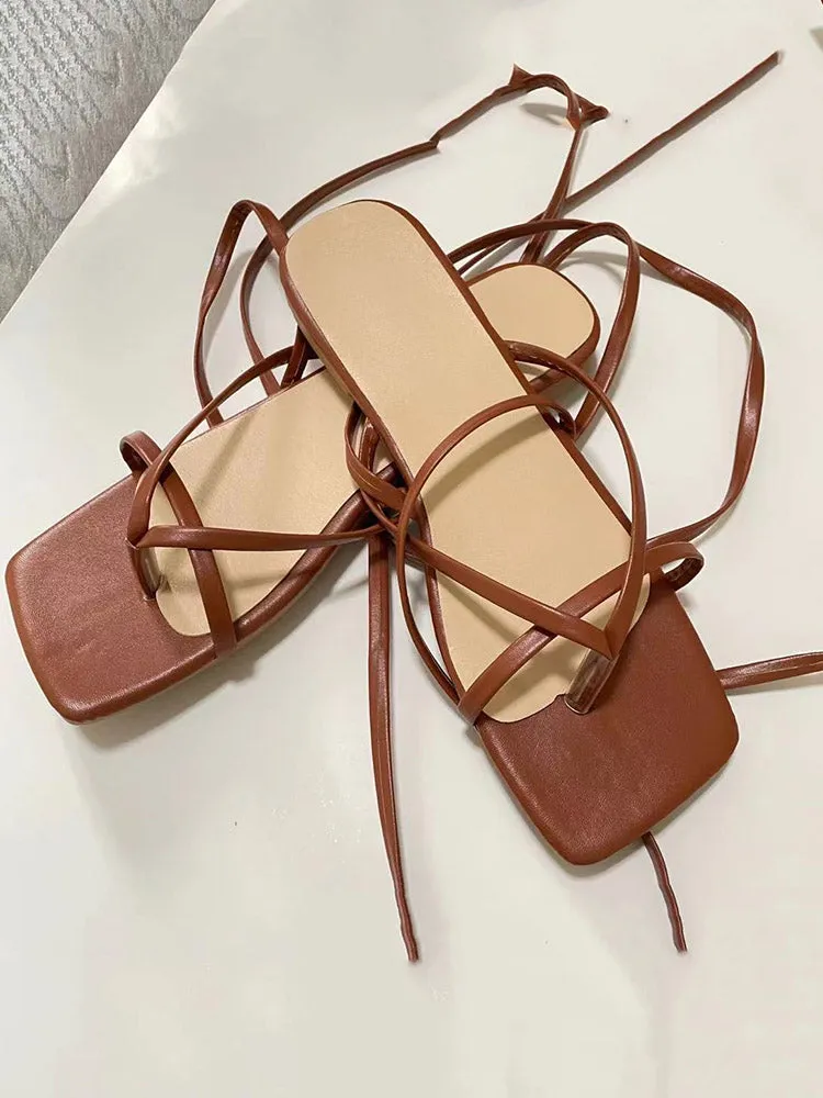 Toleet Cross Strapping Flat Sandals